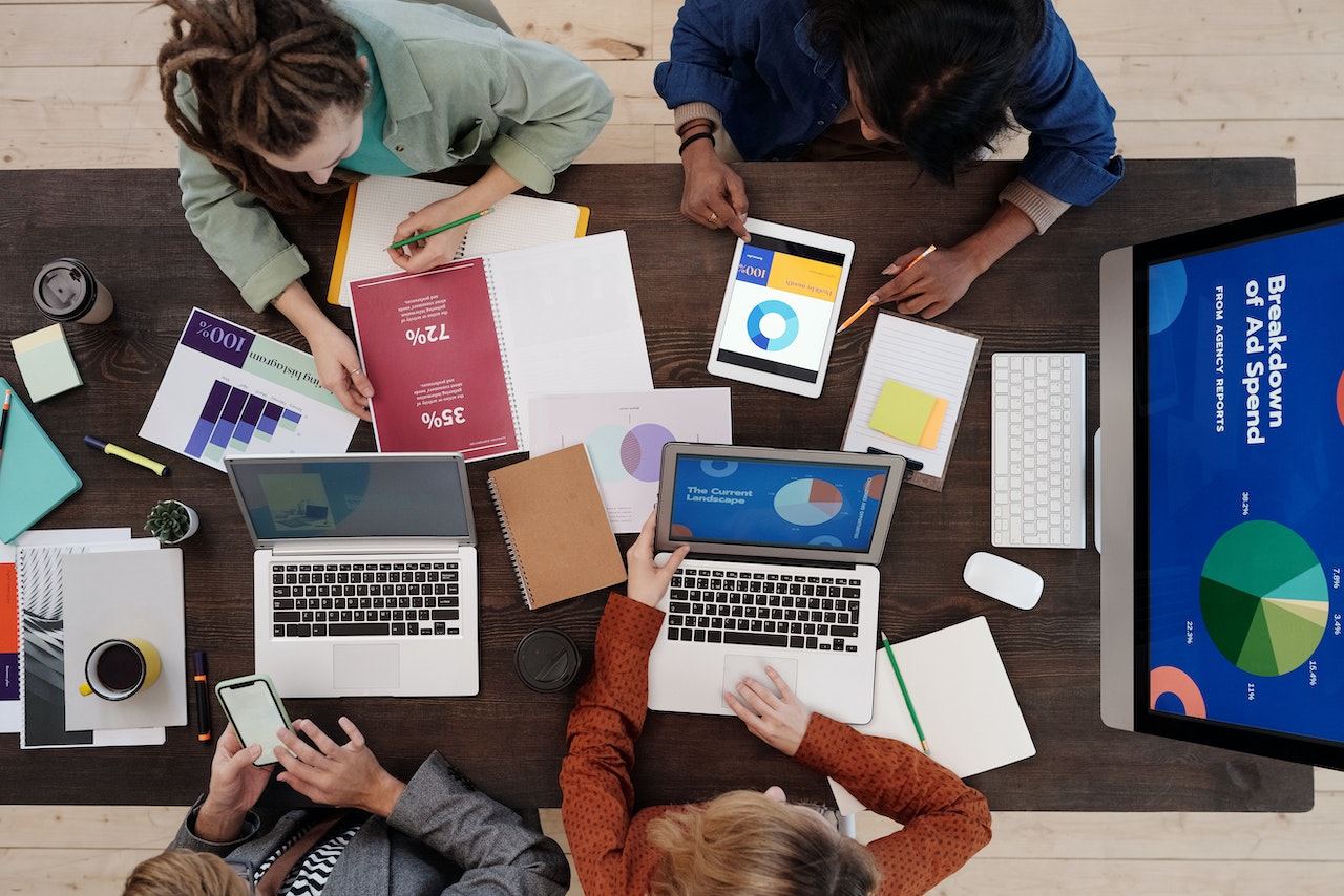 Advertising-team-working-together-in-meeting-psychology-degree-jobs