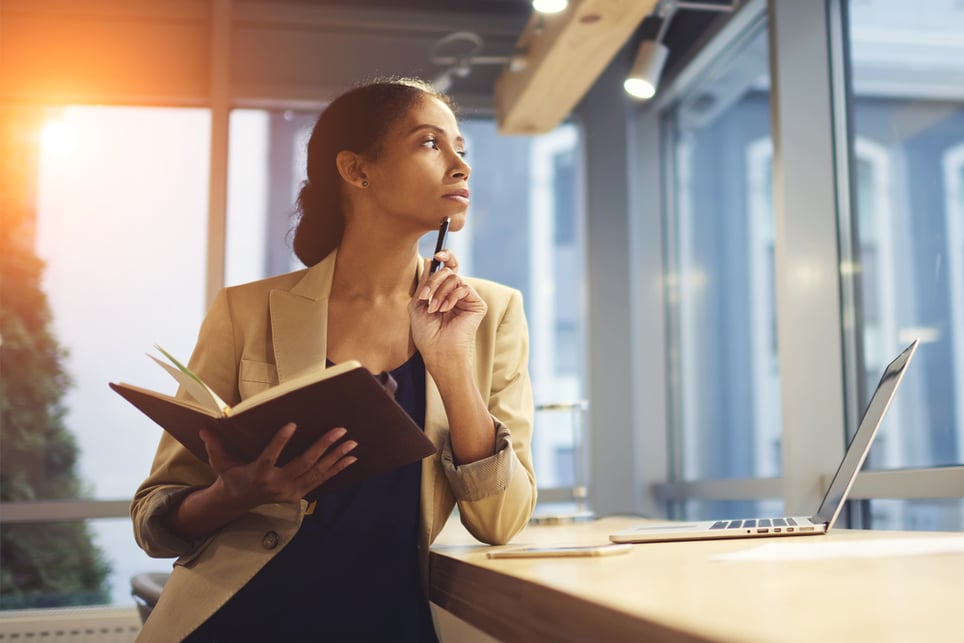 Black-women-thinking-and-looking-for-window-how-to-overcome-lack-of-ambition