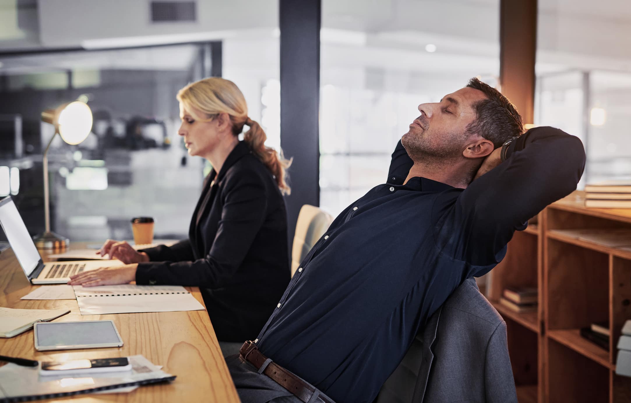 Businessman-having-a-break-at-office-how-to-overcome-laziness