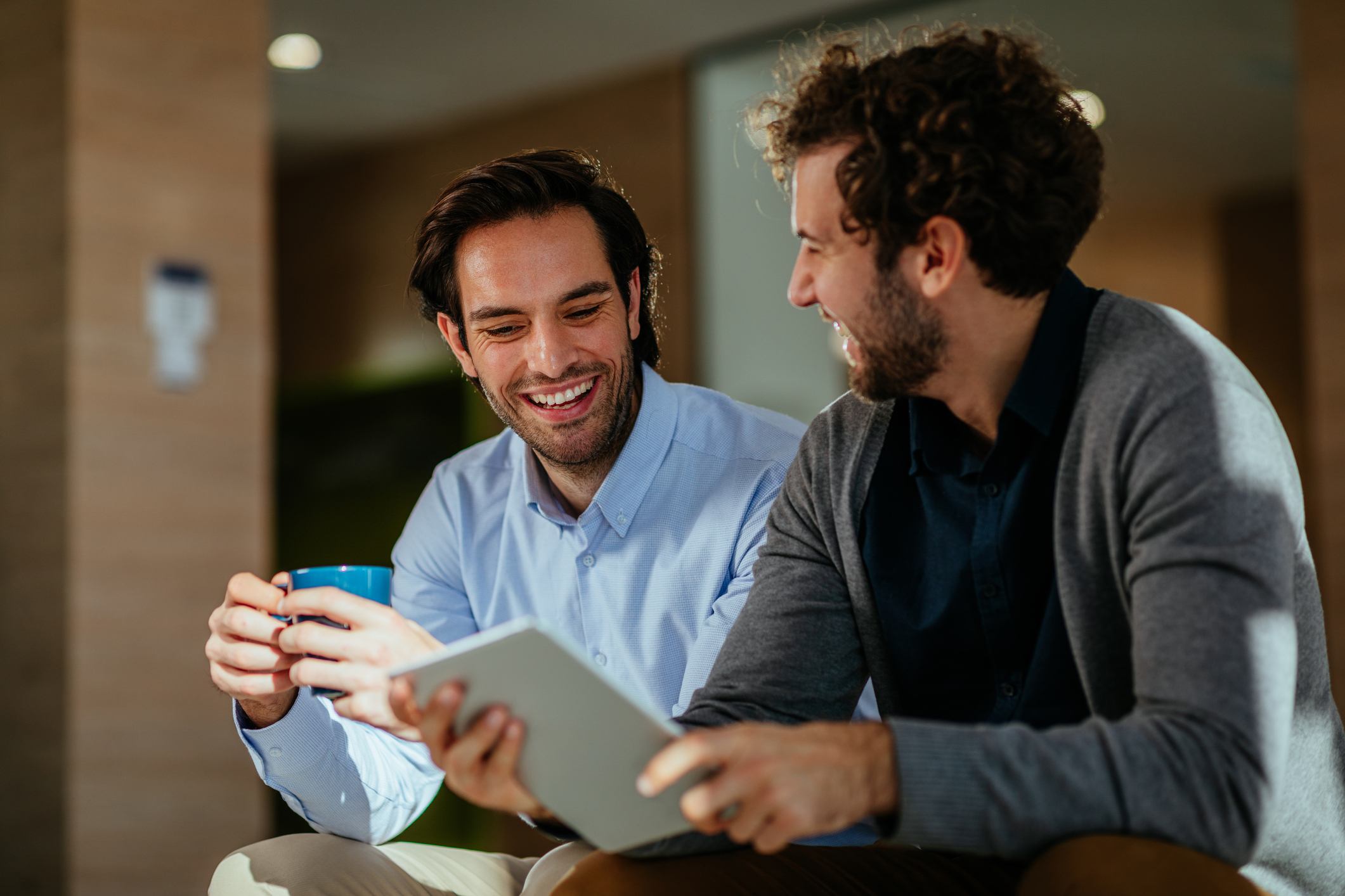 Businessmen-sitting-during-office-break-what-are-friendship-goals