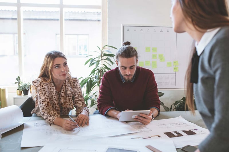 Colleagues-Working-how-to-create-a-work-plan