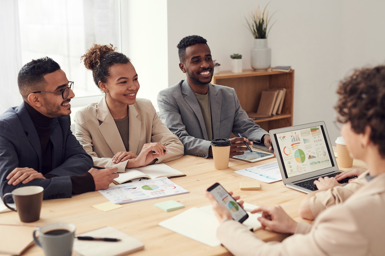 Collegues-at-meeting-smiling-and-talking-ethical-values