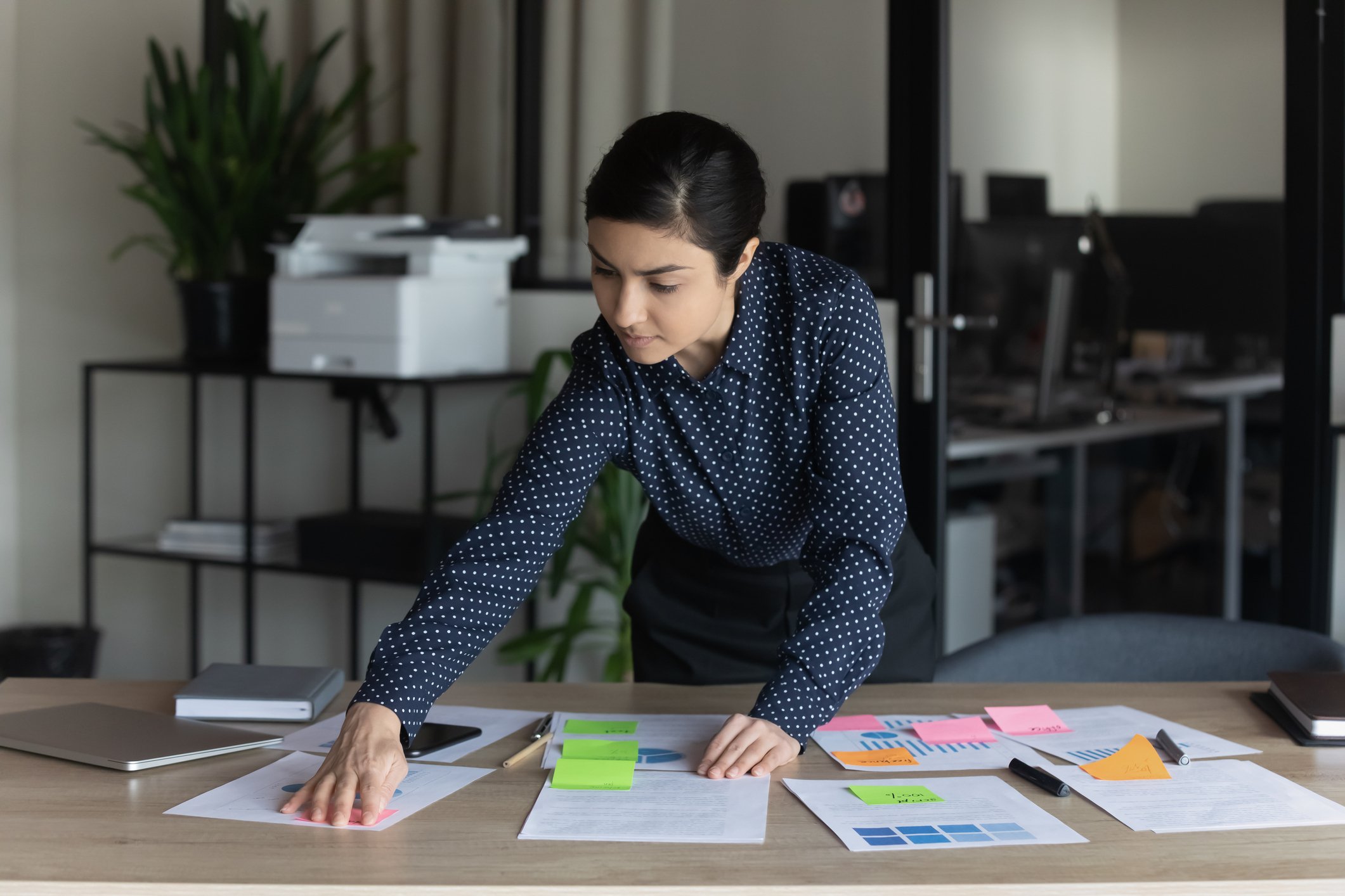 Confident-businesswoman-working-with-documents-how-to-find-a-job-you-love