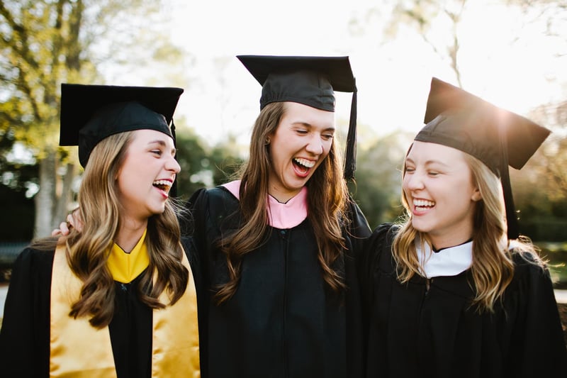 Female-Graduates-Smiling-long-term-vs-short-term-goals