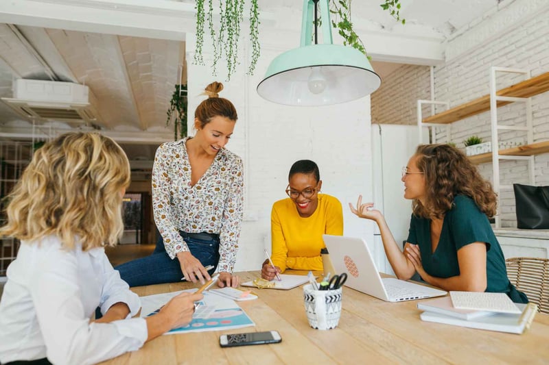 Female-Team-Working-In-A-Modern-Office-how-to-challenge-yourself