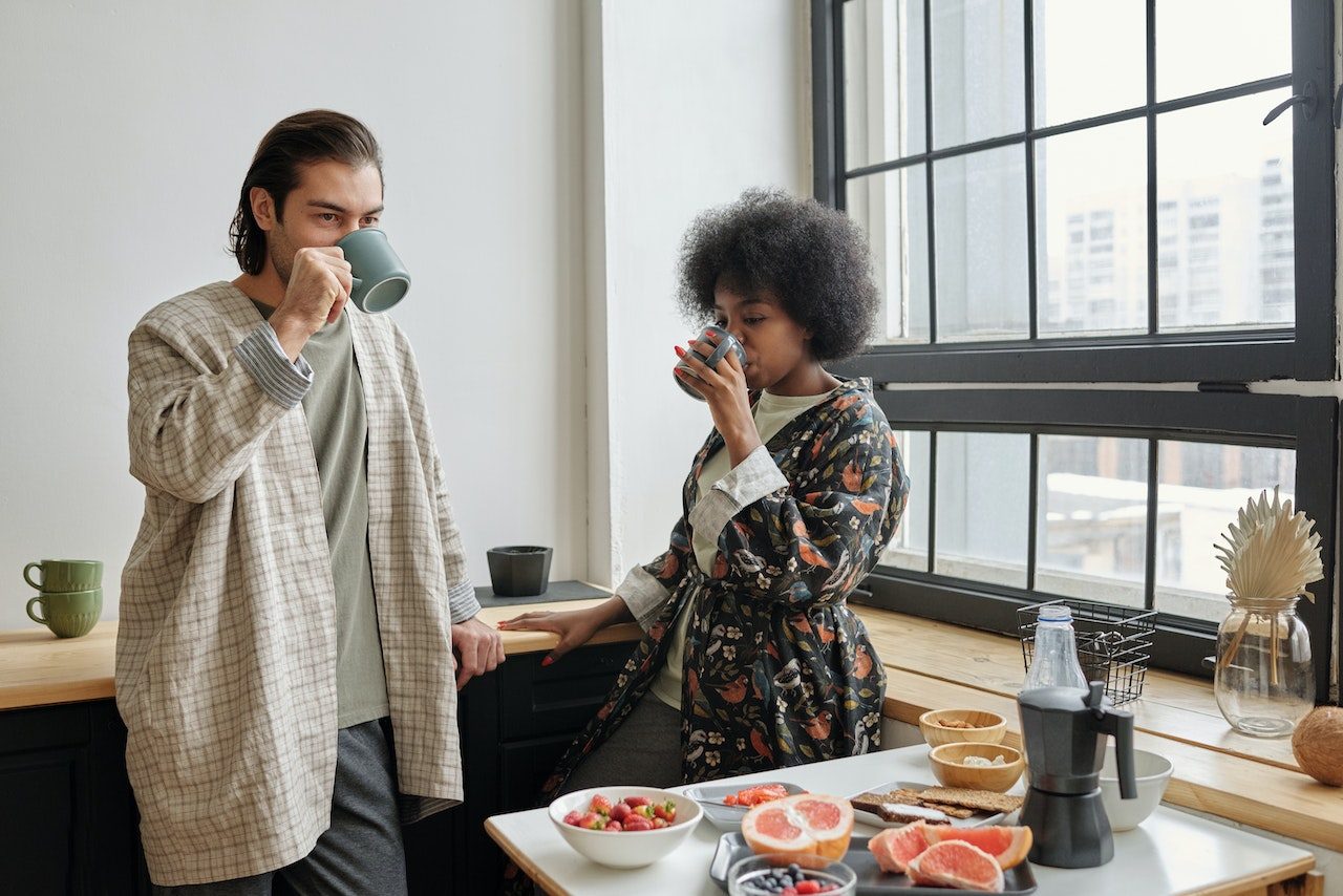 Man-and-woman-at-home-drinking-coffee-how-to-wake-yourself-up
