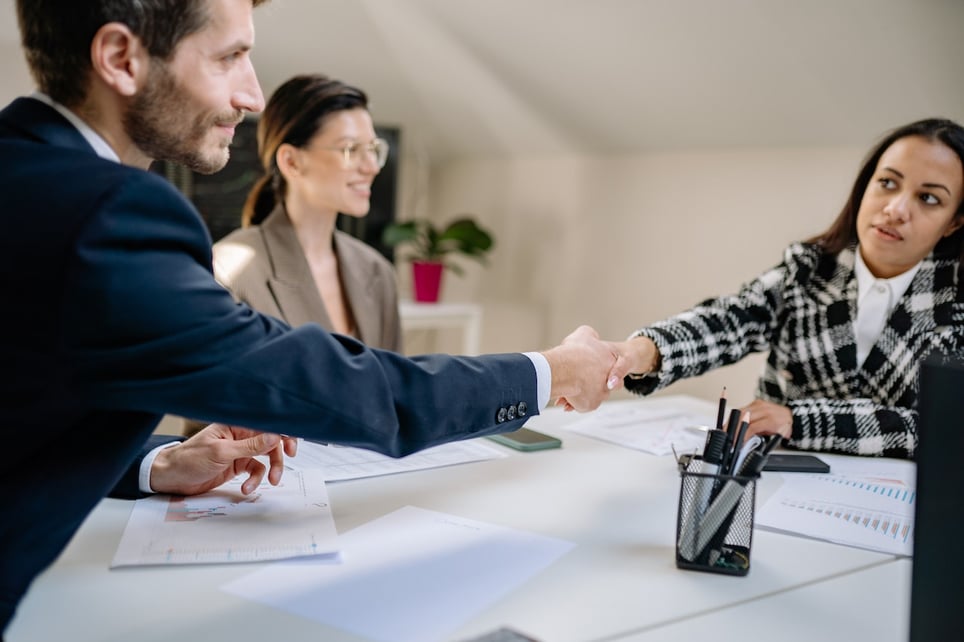 Man-shaking-hand-confidently-of-hiring-manager-negotiation-skills