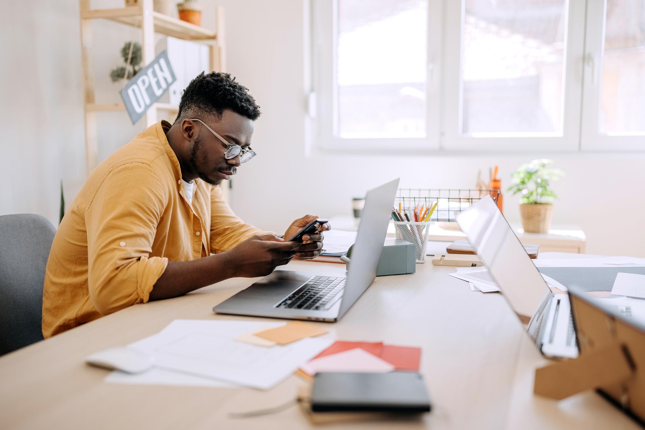 Man-taking-online-test-at-desk-personality-test-for-workplace