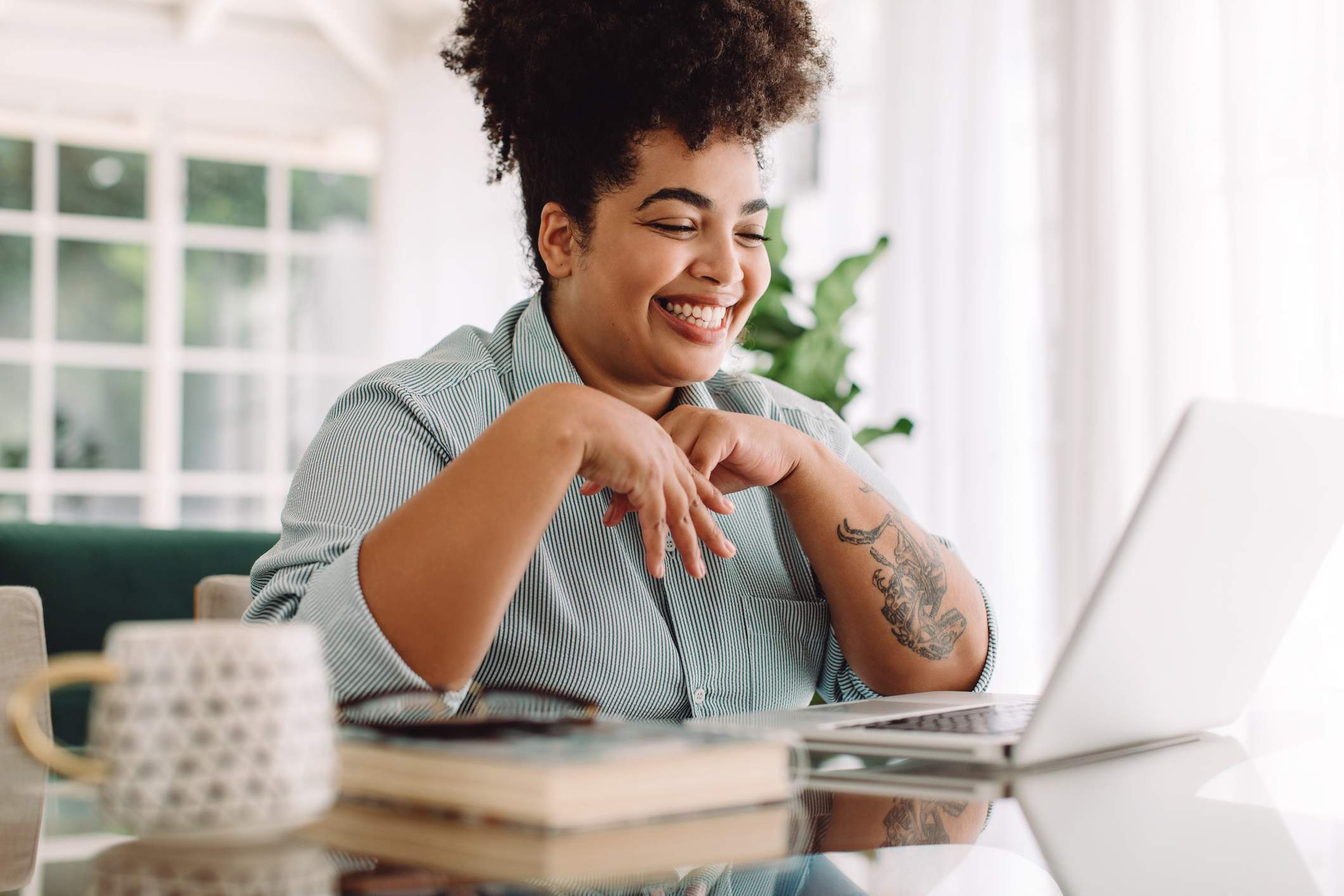 Positive-woman-video-calling-using-laptop-how-to-introduce-yourself