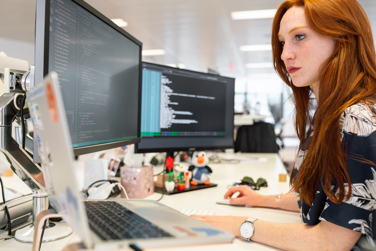 Software-engineer-woman-focusing-on-work-at-her-desk-ethical-values