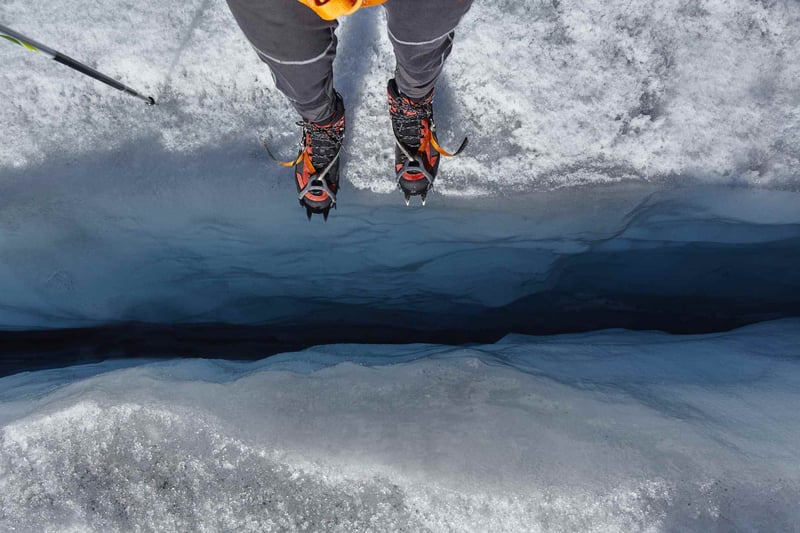Standing-on-the-edge-of-to-a-glacial-crevas