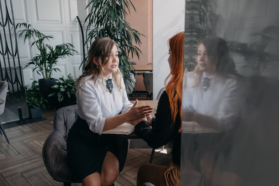 Two-coworkers-having-a-difficult-conversation-how-to-protect-yourself-from-toxic-empathy