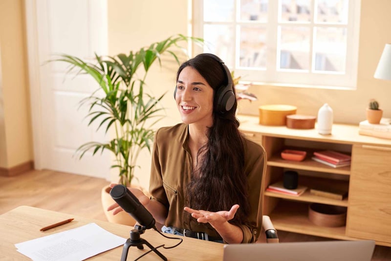 Woman-Gesticulating-Recording-Podcast-how-to-be-more-articulate