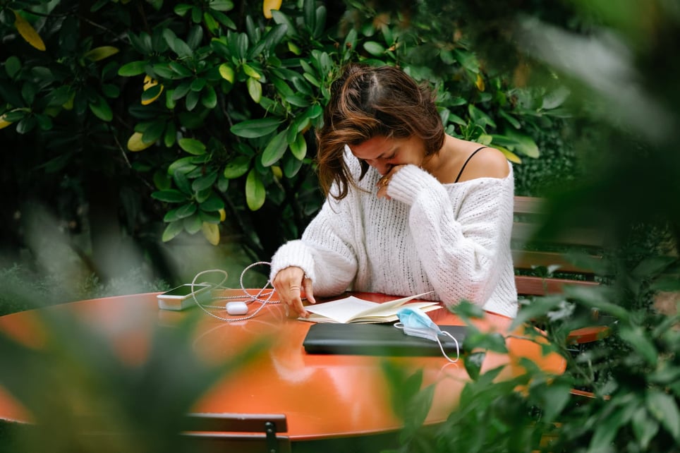 Woman-Reading-Alone-in-Garden-1