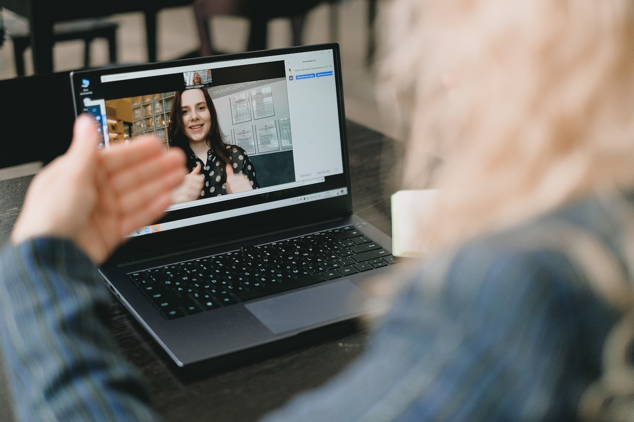 Woman-giving-conference-via-videocall-salary-negotiation-tips