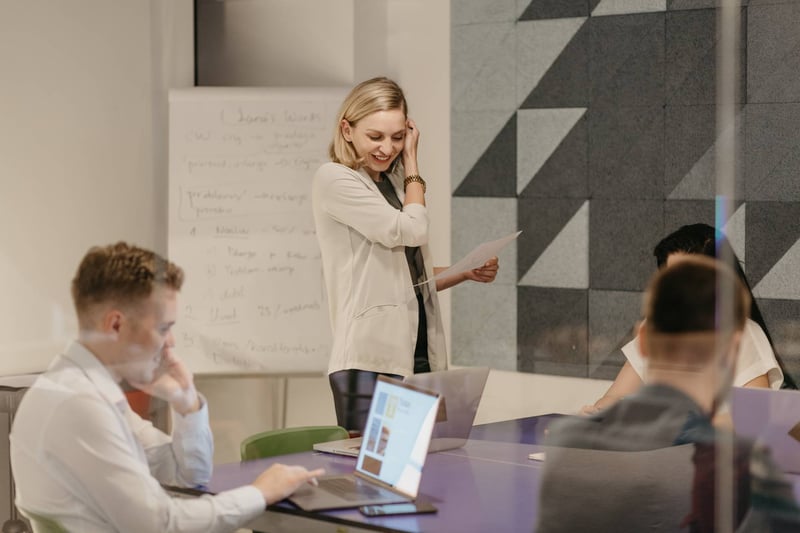 Woman-leading-a-meeting-being-center-the-center-of-attention-at-office-how-to-deal-with-difficult-coworkers