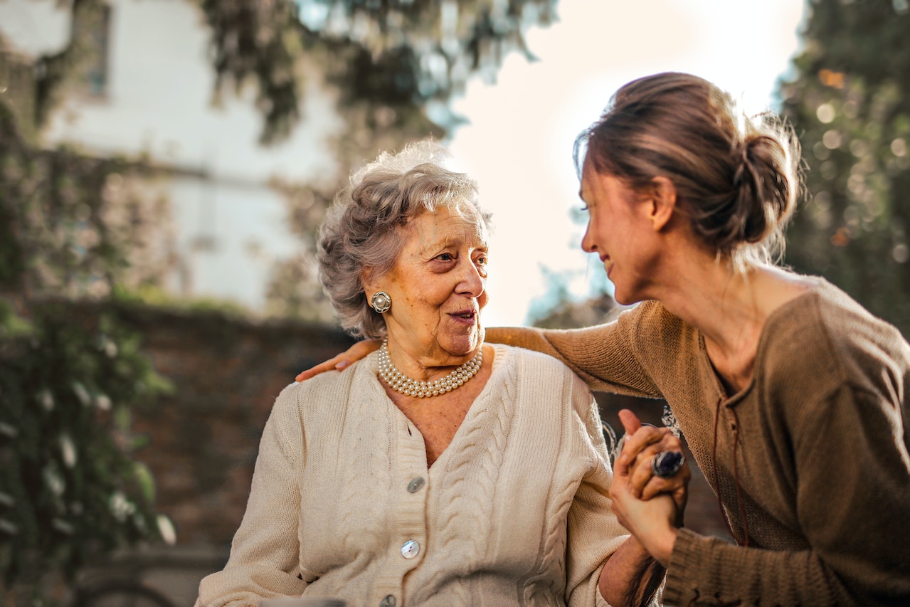 Woman-talking-deeply-with-her-grandmother-life-skills-for-adults