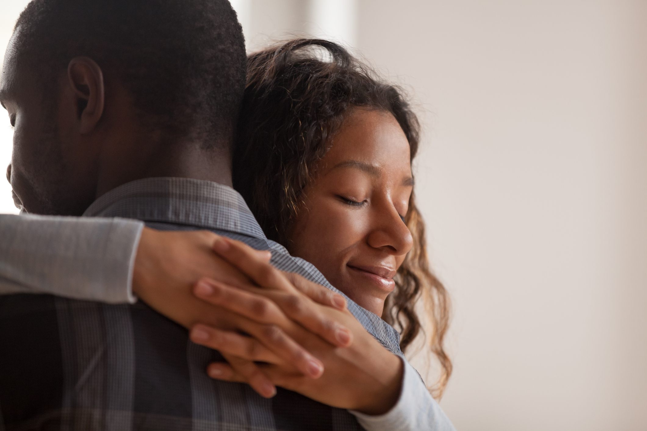Young-woman-hugging-family-member-with-relief-how-to-stop-self-pity