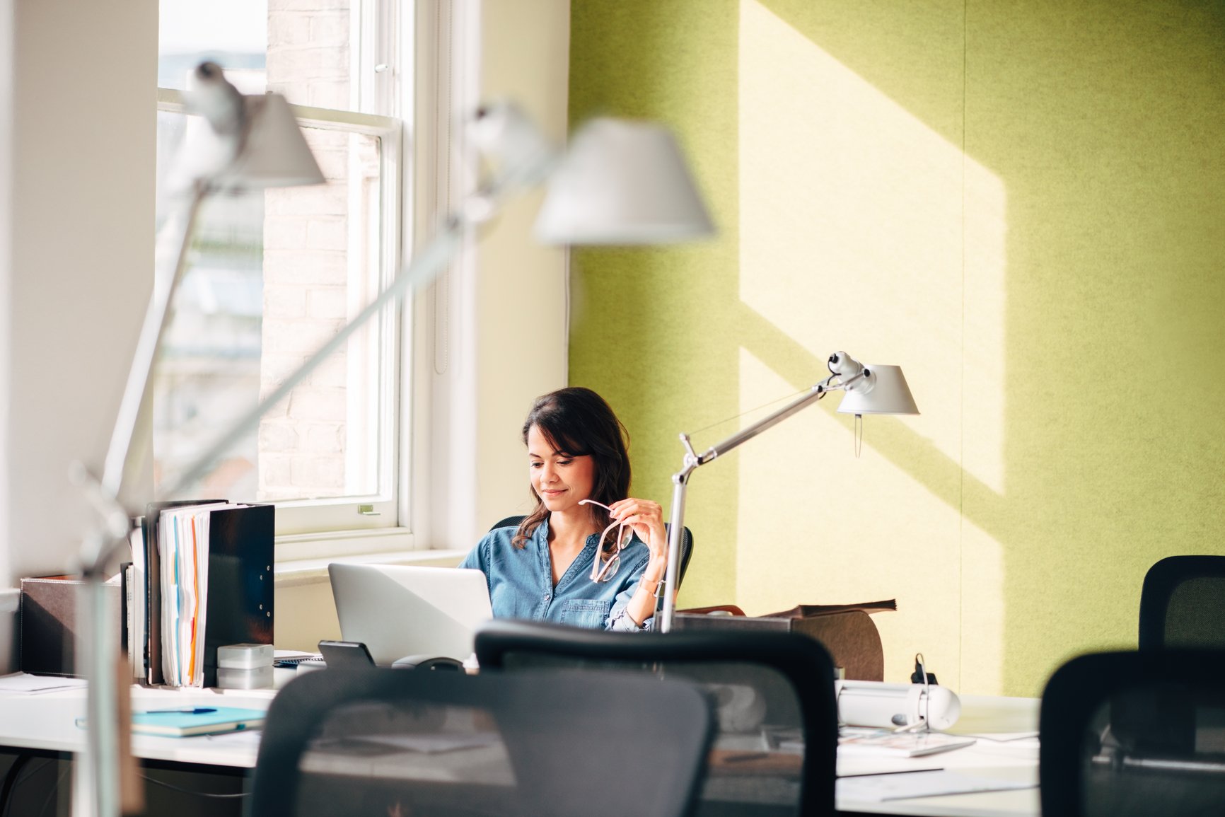 alone-in-office-on-laptop-ways-to-improve-work-performance