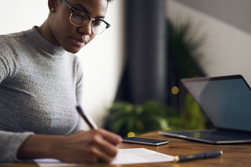 attractive-afro-american-businesswoman-signing-contract-best-work-from-home-jobs-for-mom