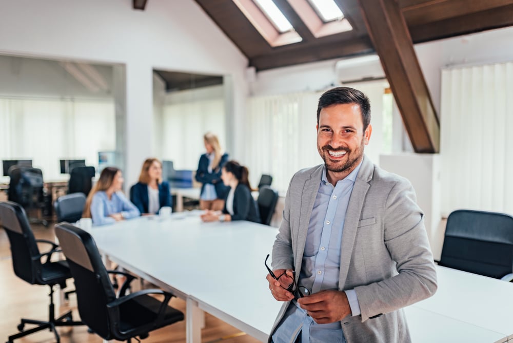 business-man-looking-at-camera-in-modern-conference-room-how-are-personal-values-formed