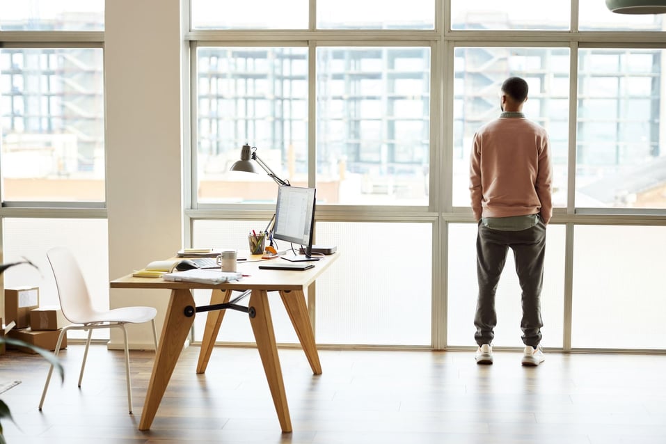 businessman-looking-through-window-what-are-limiting-beliefs