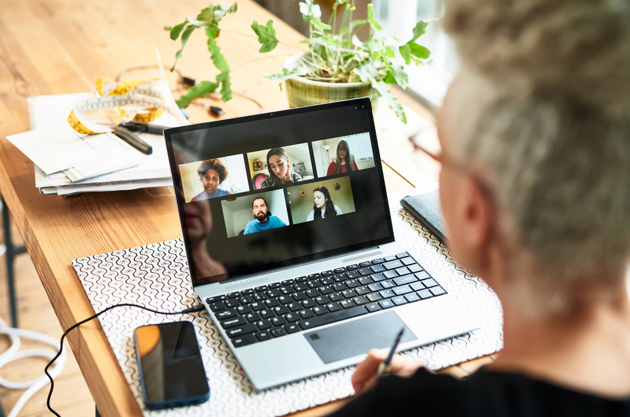 businesswoman-on-video-conference-millenials-and-burnout