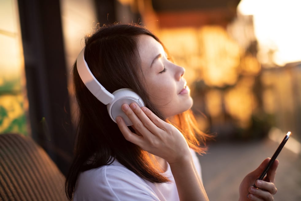 close-up-shot-of-young-woman-enjoying-music-how-to-use-music-to-concentrate