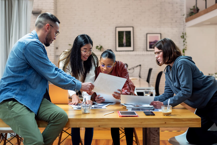 colleagues-having-a-meeting-direct-reports