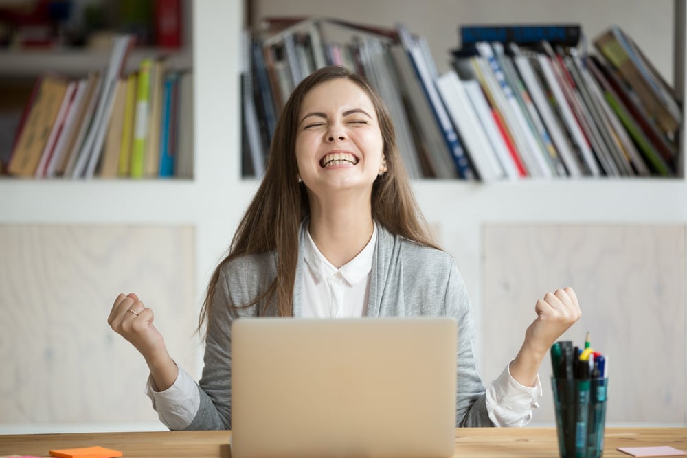 excited-female-celebrating-self-compassion-and-motivation