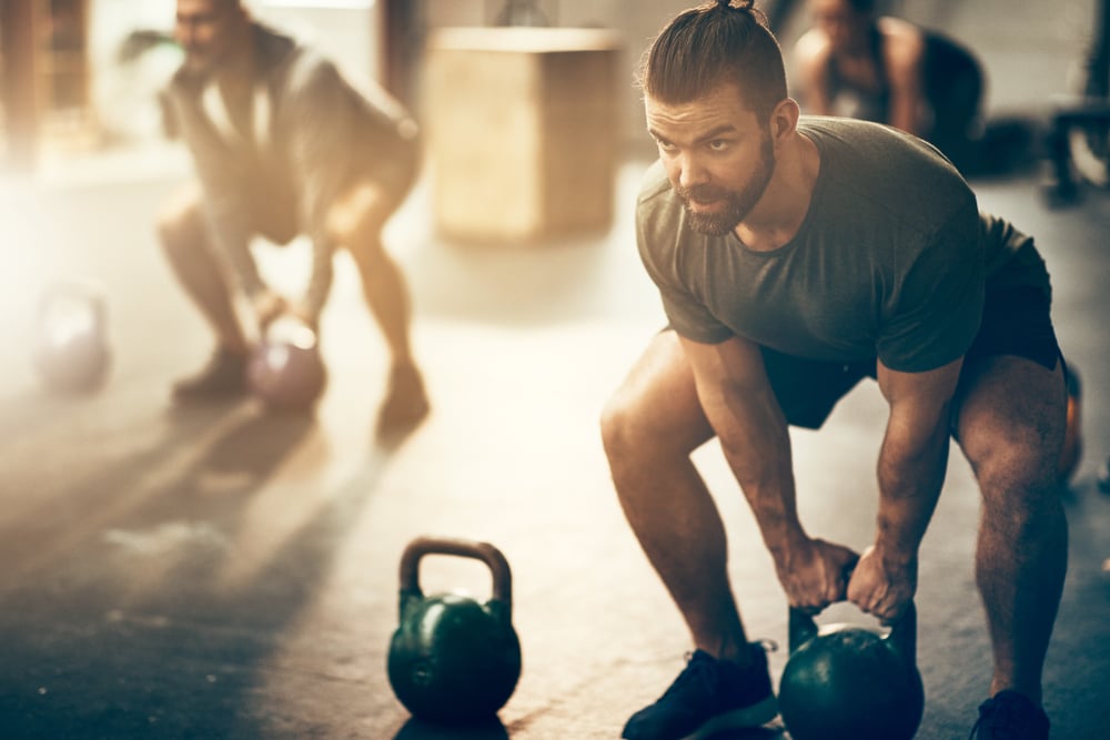 fit-young-man-doing-exercise-how-to-enjoy-life