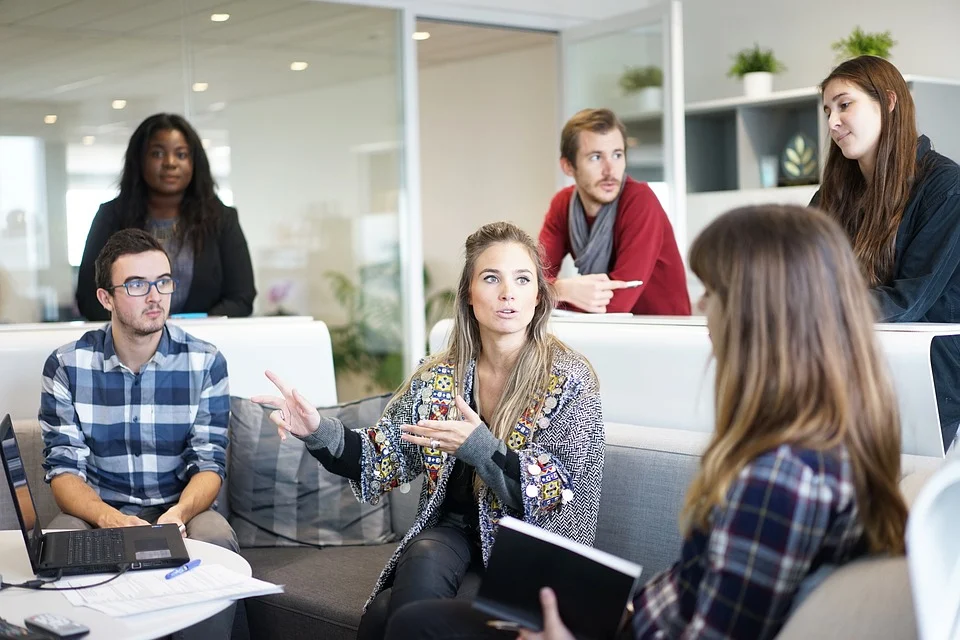 group-of-employees-having-a-conversation-how-to-make-better-decisions