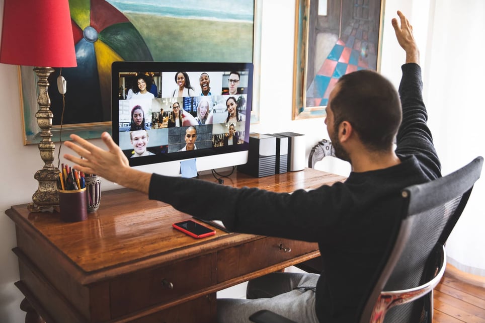 happy-man-on-a-video-call-with-friends-and-extending-his-arms-how-to-make-friends-online