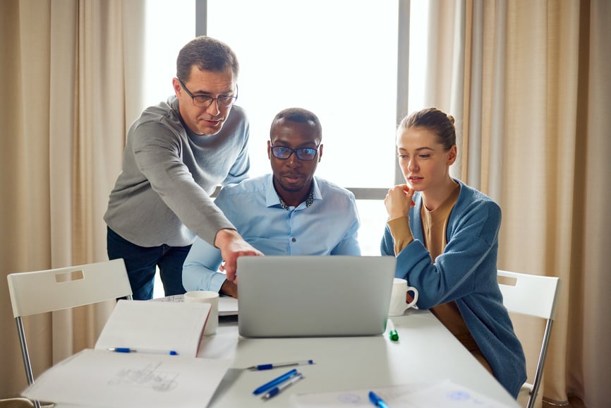 male-leader-and-employees-in-a-meeting-values-of-a-leader