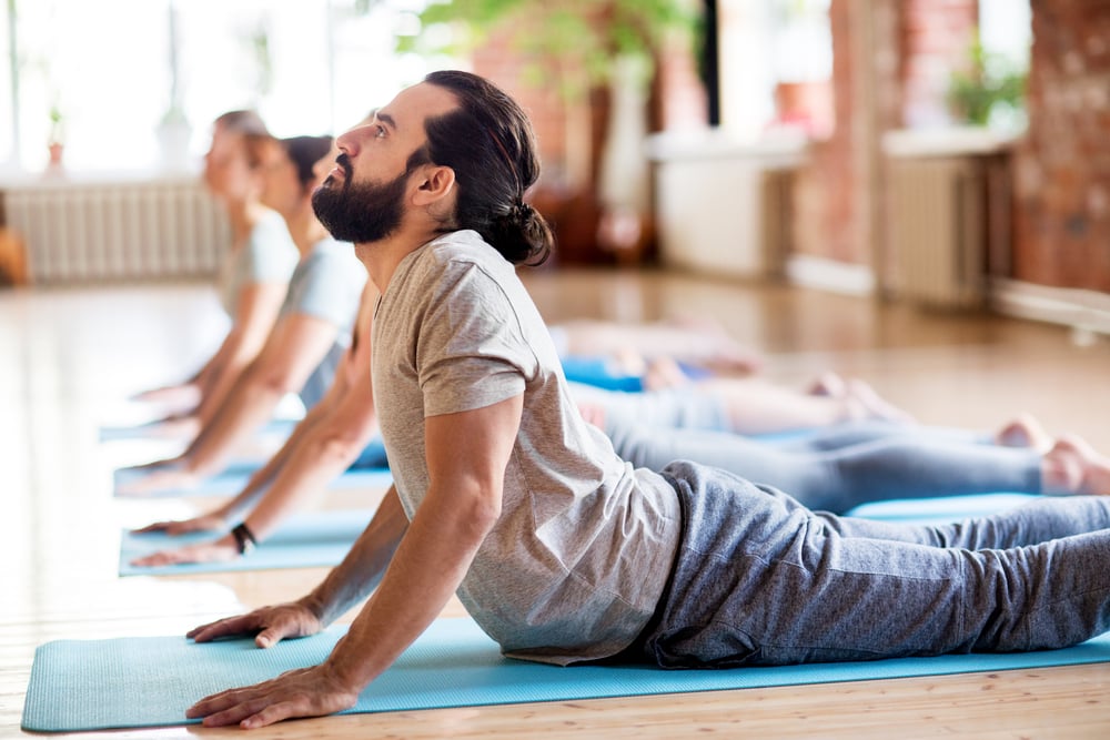 man-doing-yoga-on-the-floor-how-to-rest