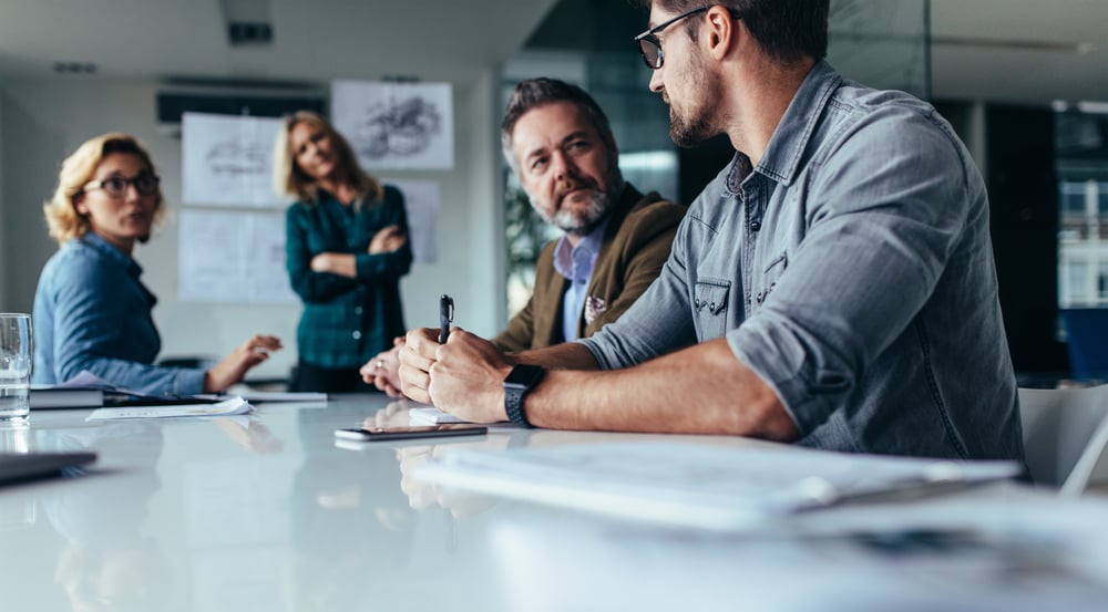 man-explaining-ideas-during-meeting-self-awareness-in-the-workplace