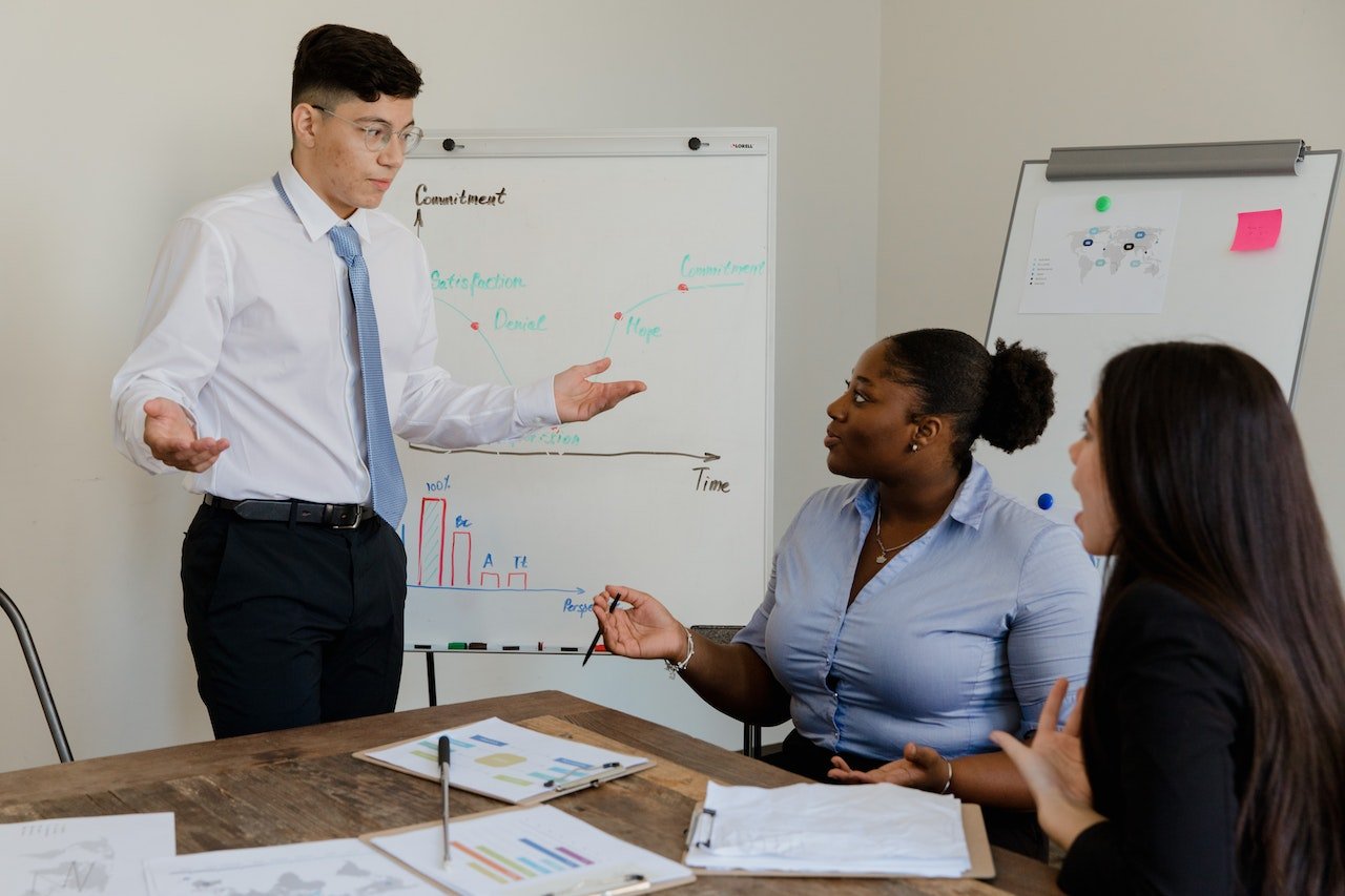 man-giving-presentation-on-work