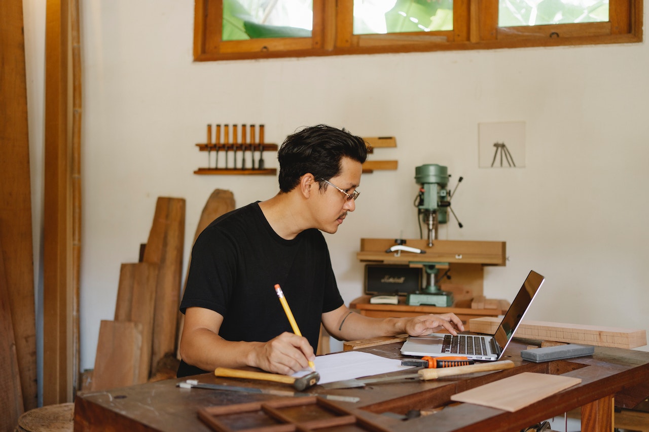 man-in-desk-getting-work-done