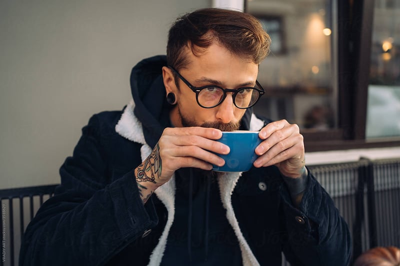 man-sipping-coffee-how-to-focus-better-at-work