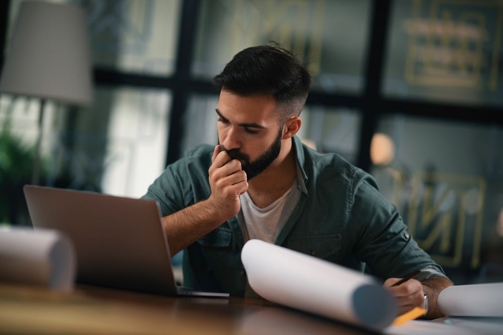 man-thinking-while-working-self-awareness-in-the-workplace