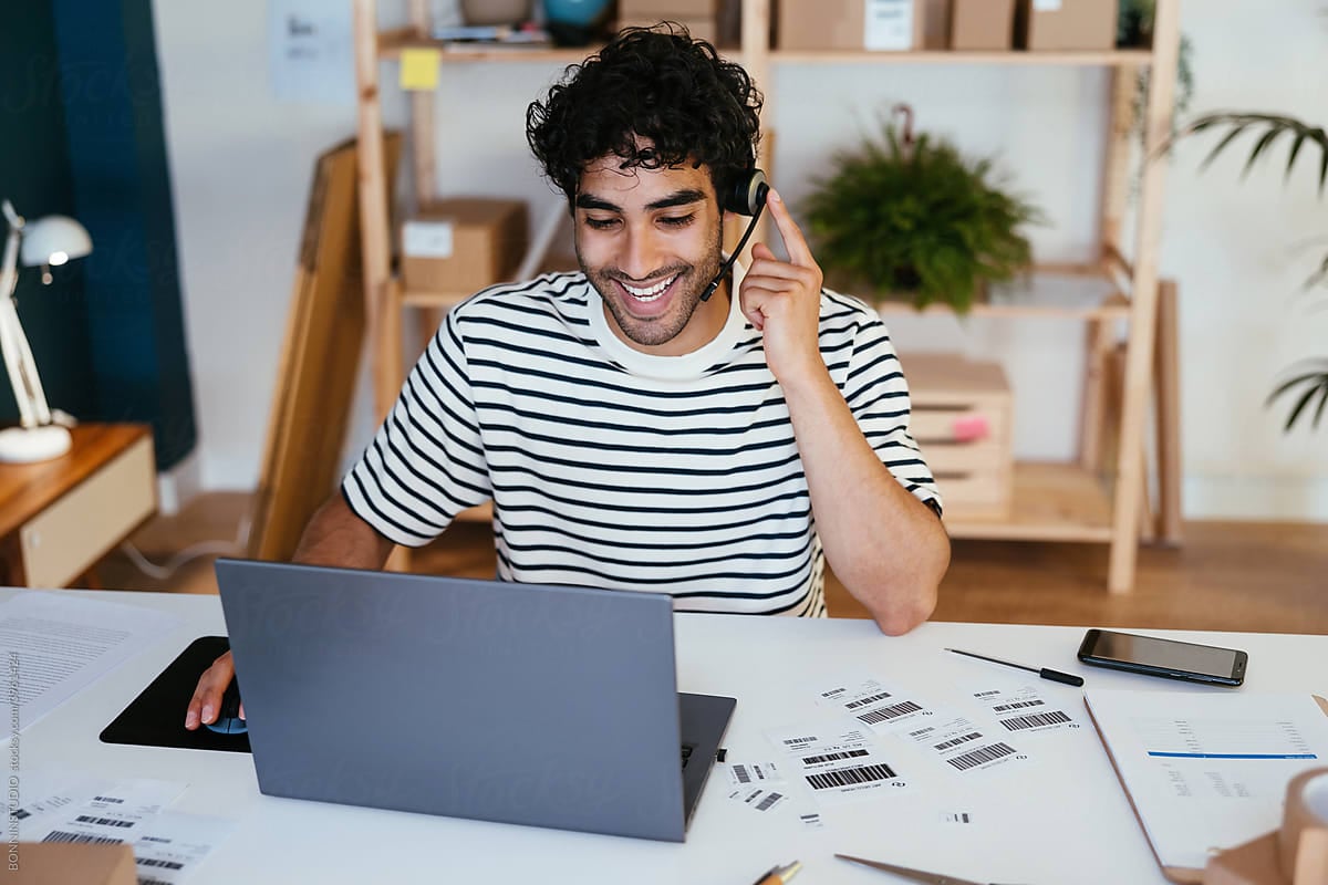 man-with-headset-speaking-up