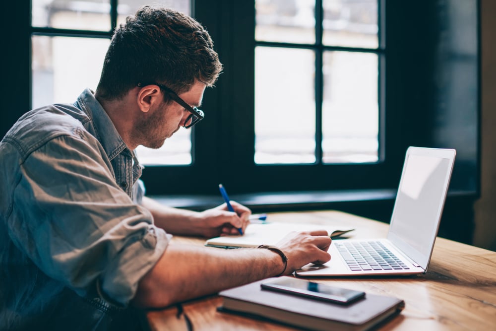 man-writing-down-his-thoughts-lack-of-concentration-and-anxiety