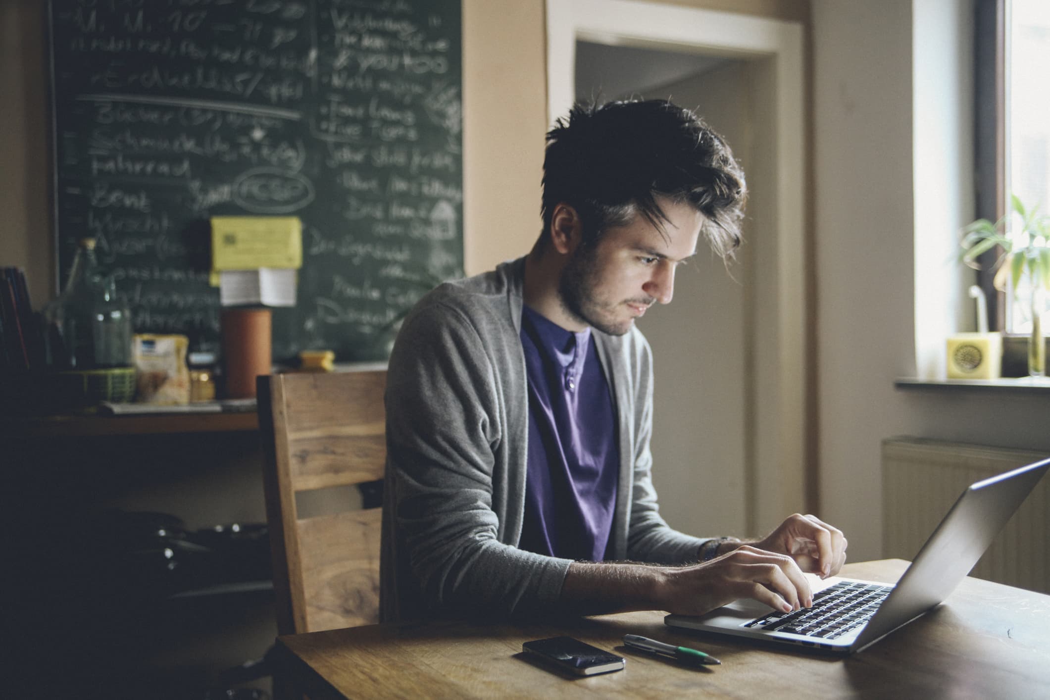 man-writing-on-computer-email-etiquette