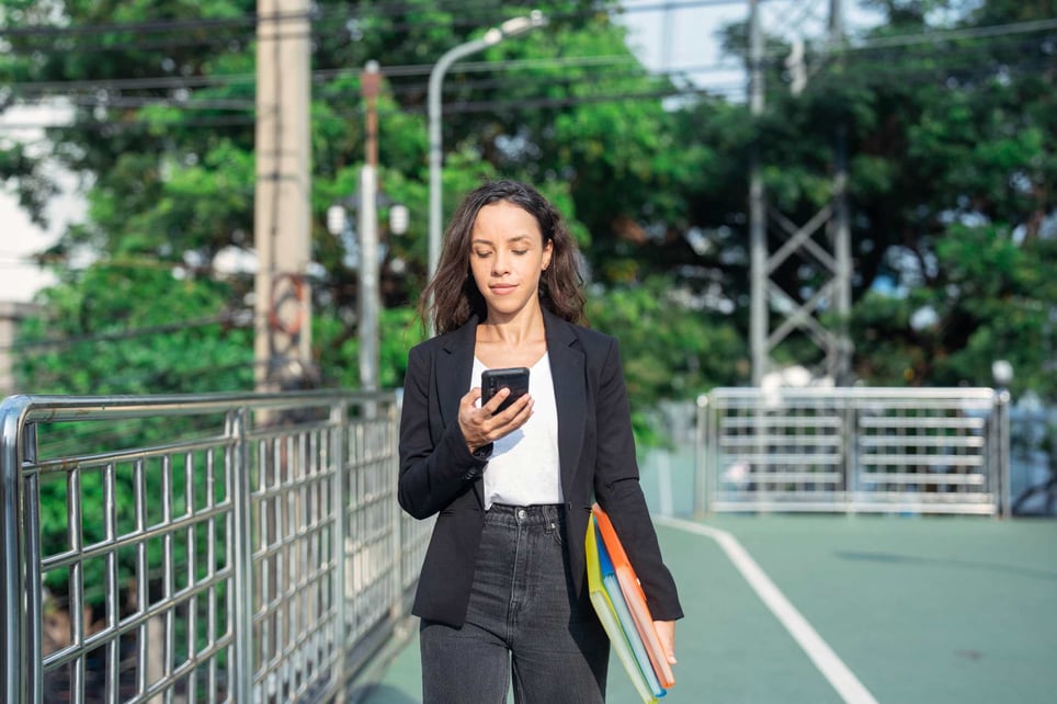 portrait-of-businesswoman-standing-and-holding-document-why-are-you-leaving-your-current-job