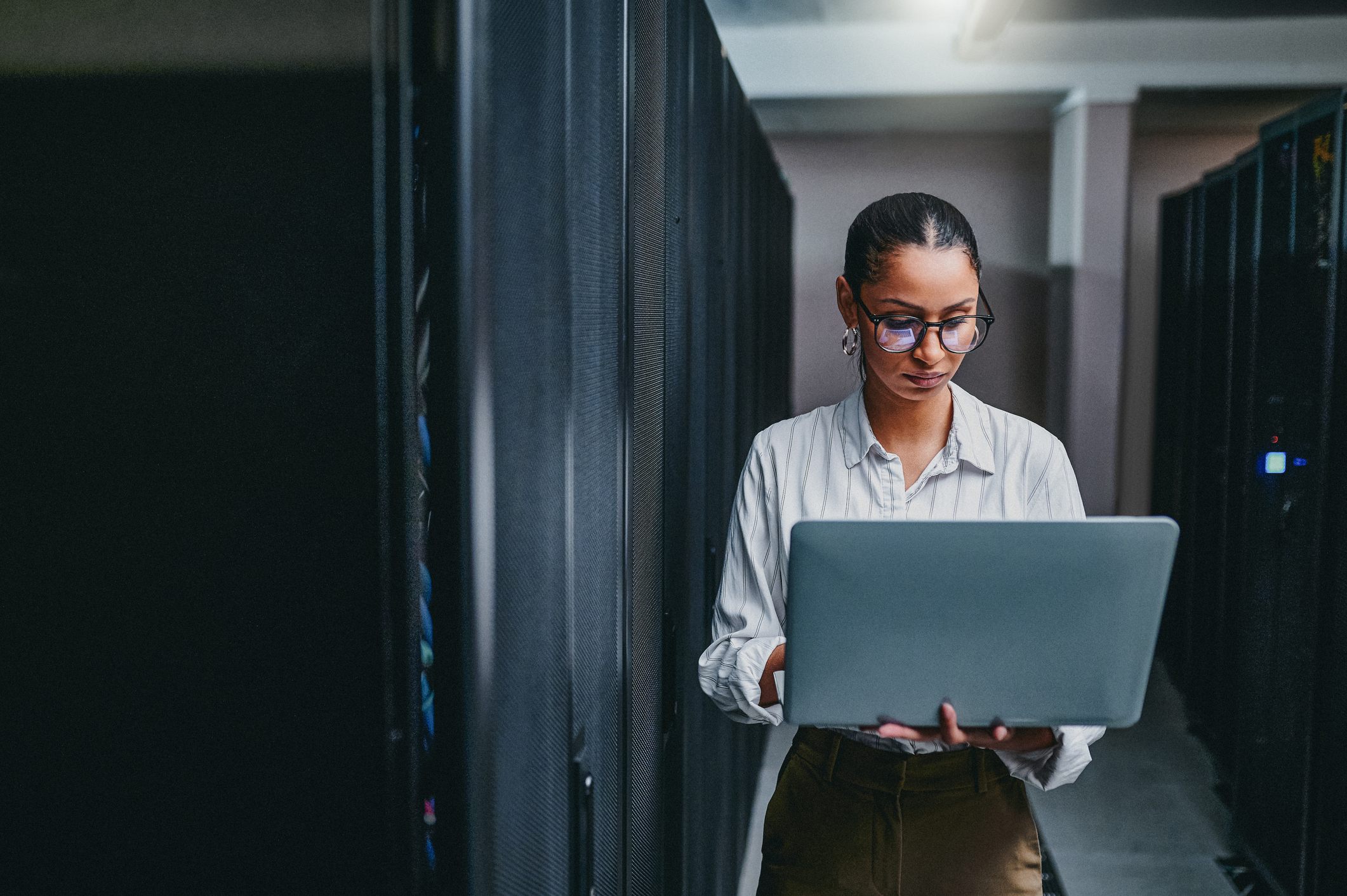 shot-of-a-young-woman-focused-using-a-laptop-short-term-professional-goals