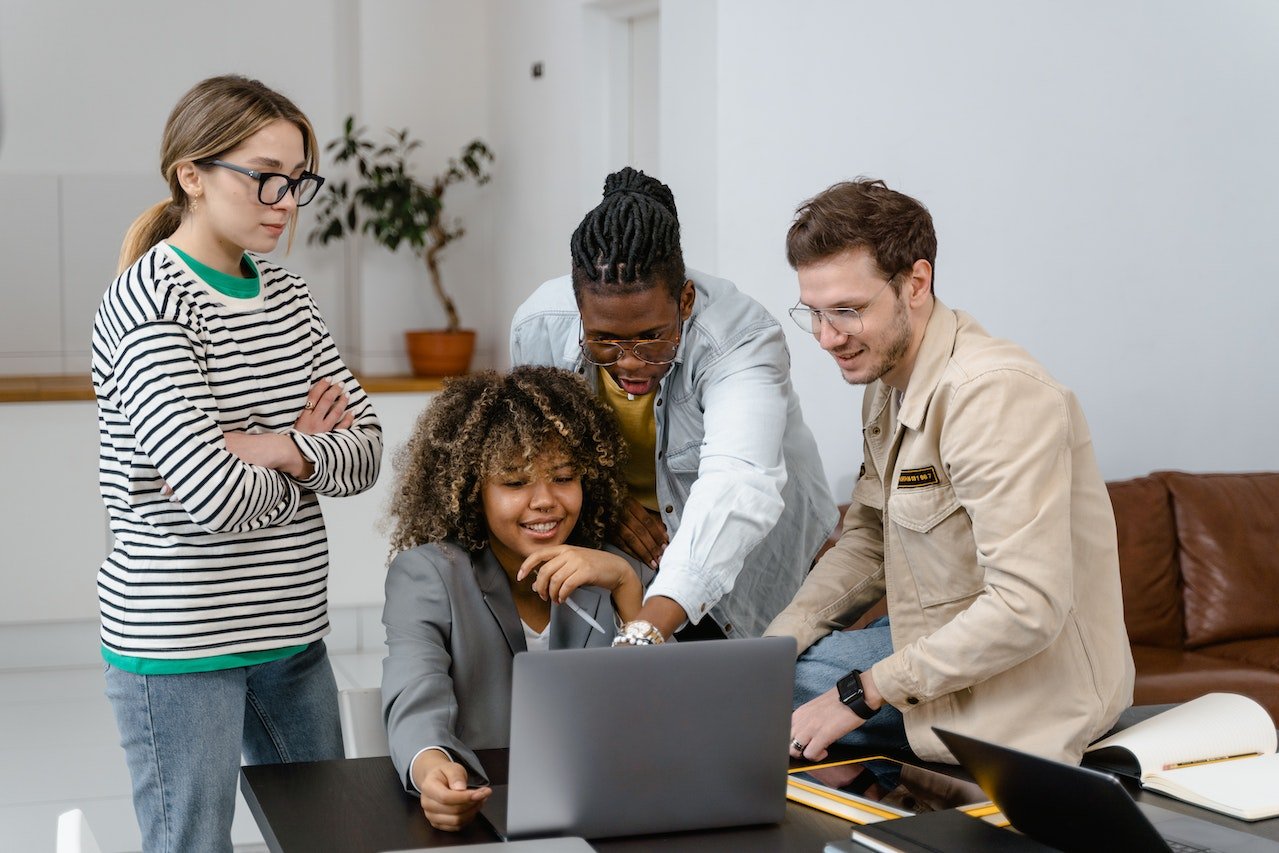 team-commenting-on-work-in-computer