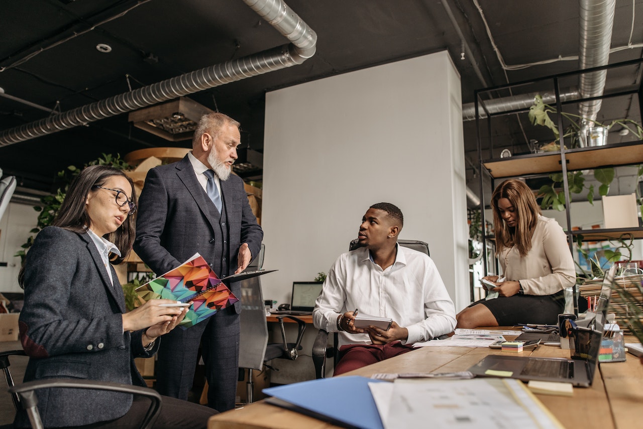 team-talking-in-office-working-together