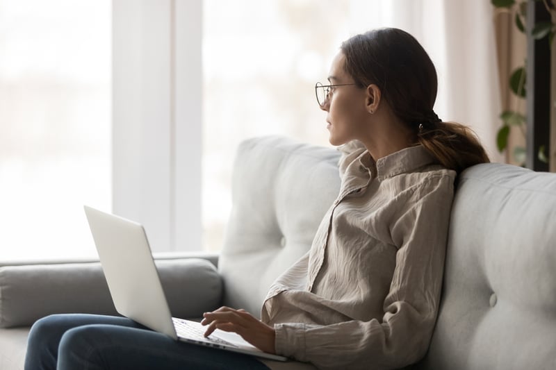 thoughtful-young-woman-with-eyeglasses-sitting-with-a-computer-what-to-do-when-you-mess-up-at-work