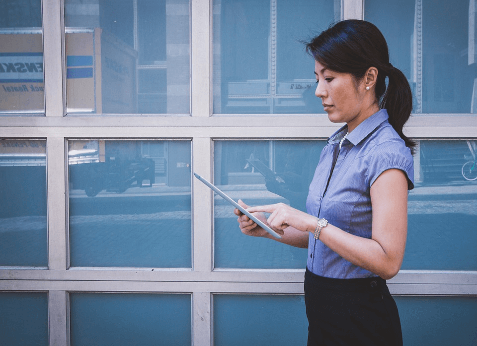 woman-looking-at-tablet-work-life-balance