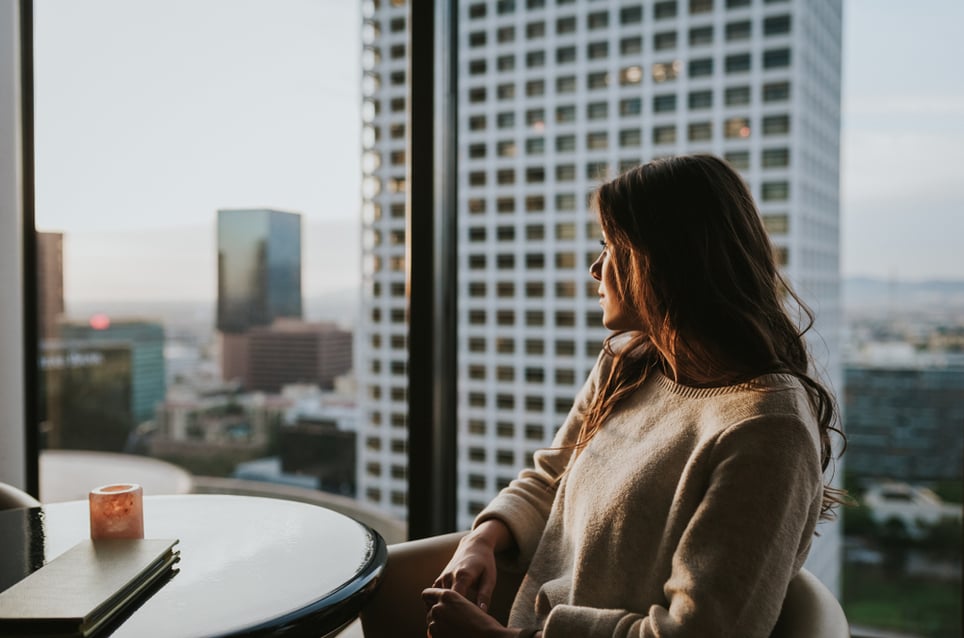 woman-looking-through-a-window-self-awareness-in-the-workplace